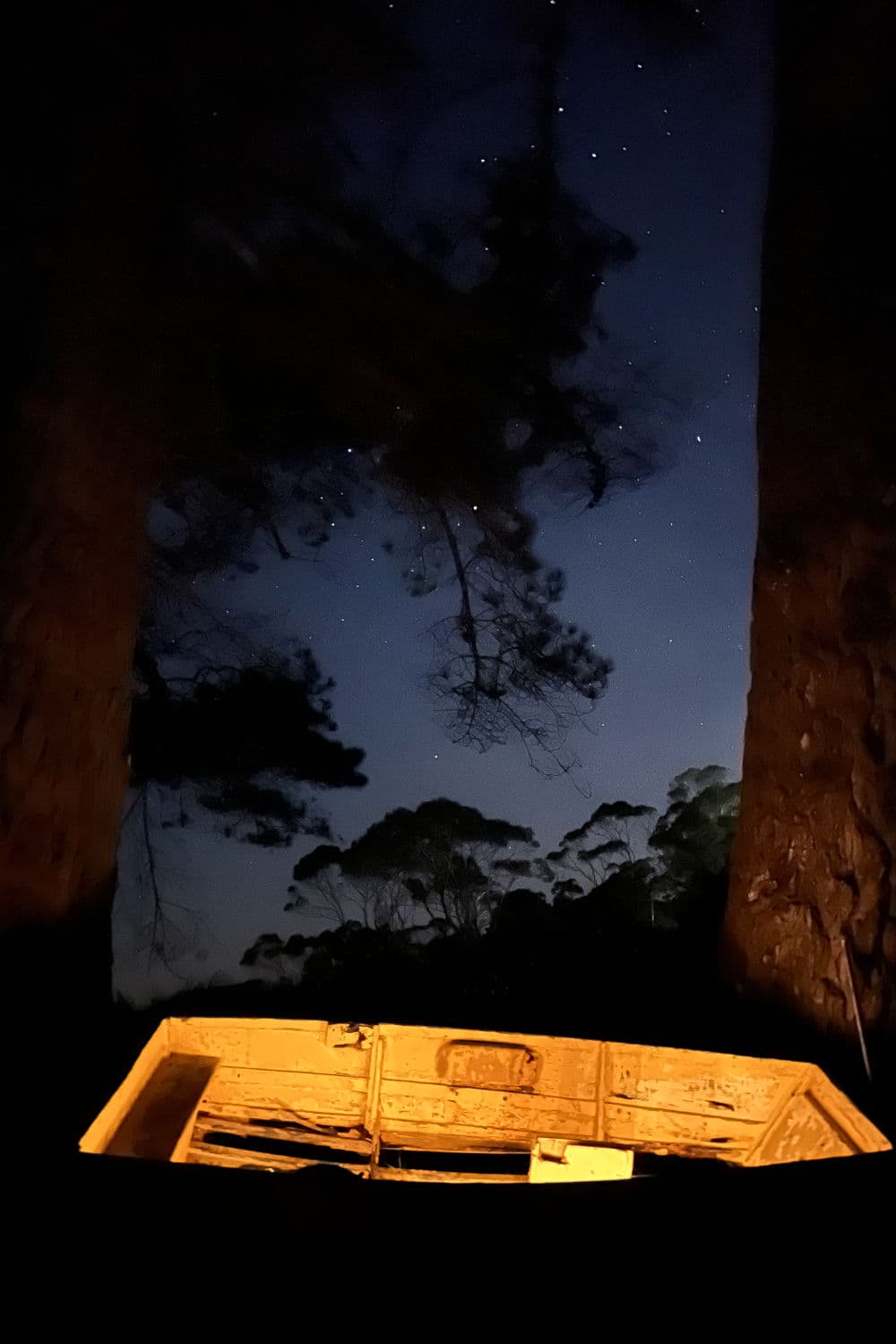 A boat at night illuminated from within